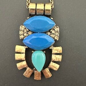 Gold, blue,‎ and turquoise pendant necklace